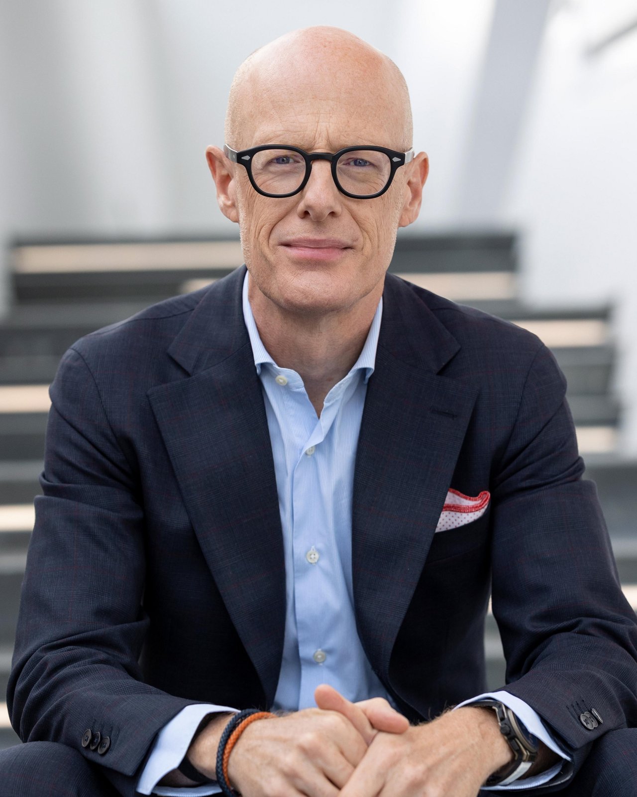Portrait of Porsche CEO Michael Leiters in a navy suit