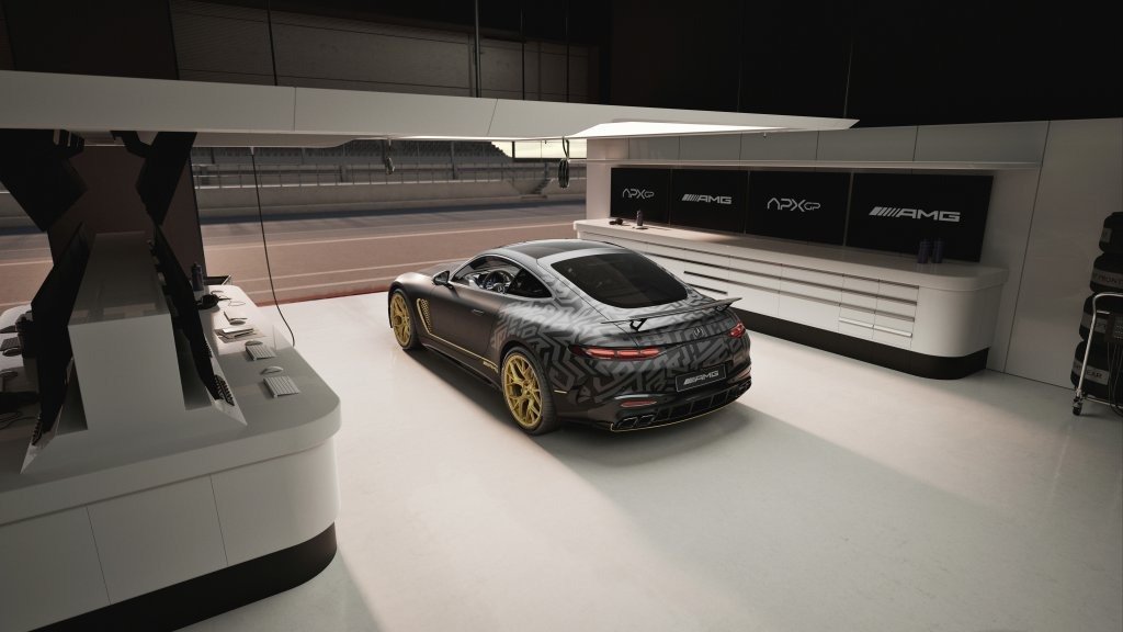 Mercedes-AMG GT 63 APXGP Edition in a pit garage, rear three-quarter view