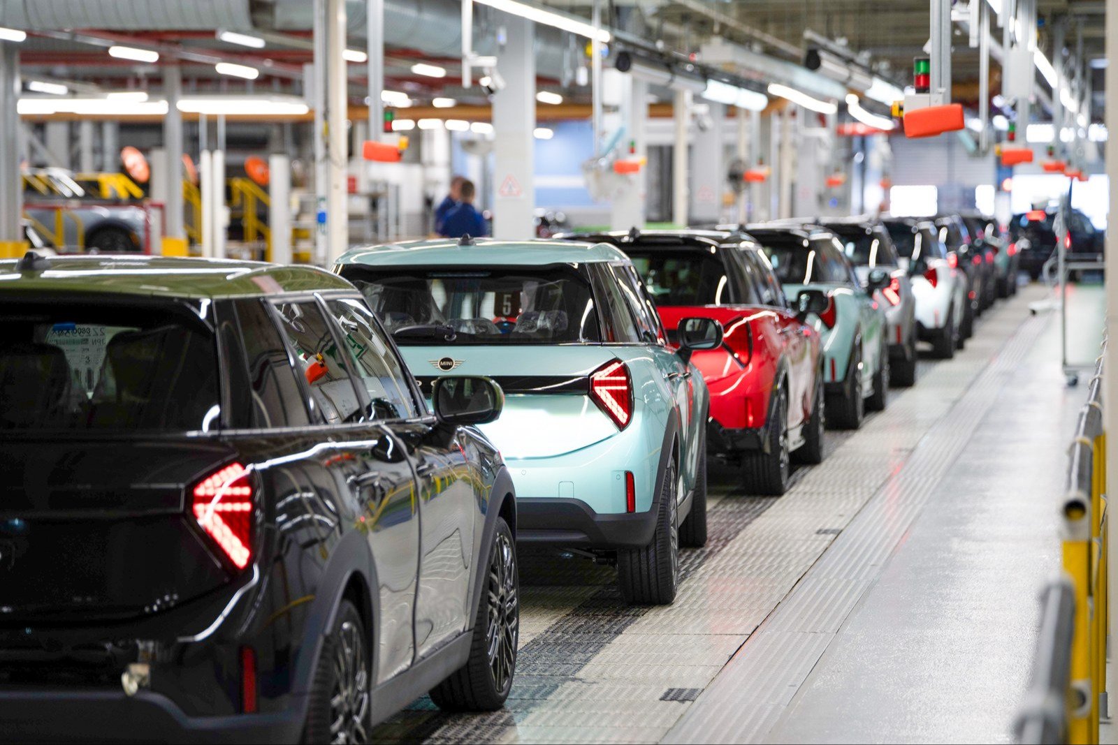 Row of finished MINI Cooper hatchbacks on the Oxford line