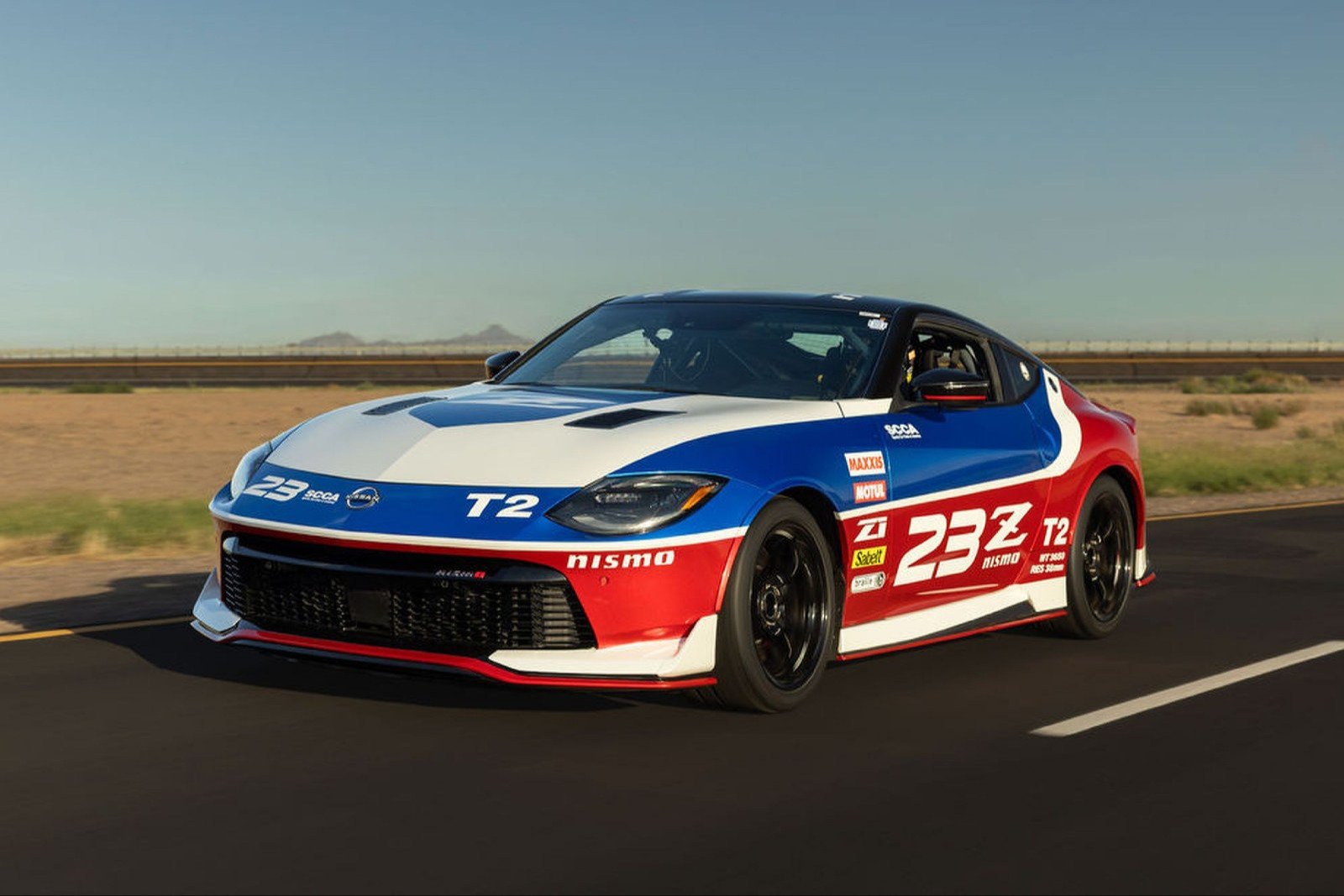 Nissan Project NAT2 Z race car in historic-inspired livery