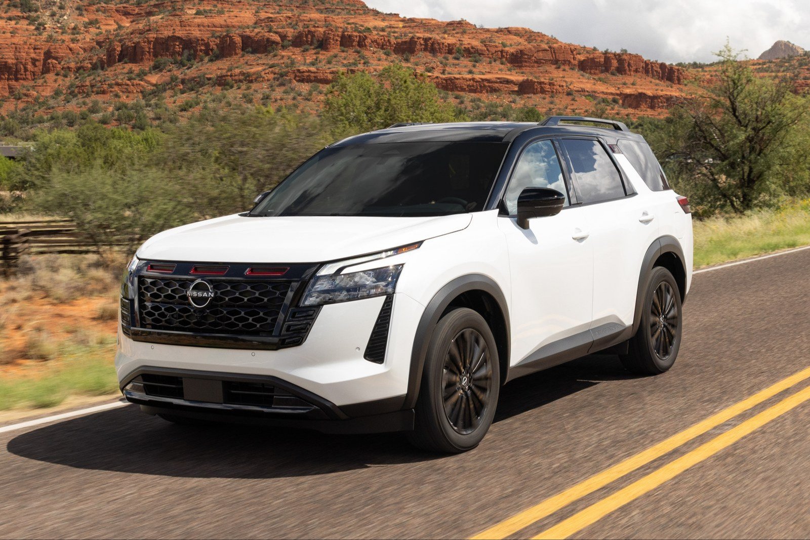 2027 Nissan Pathfinder Special Edition driving on a desert road