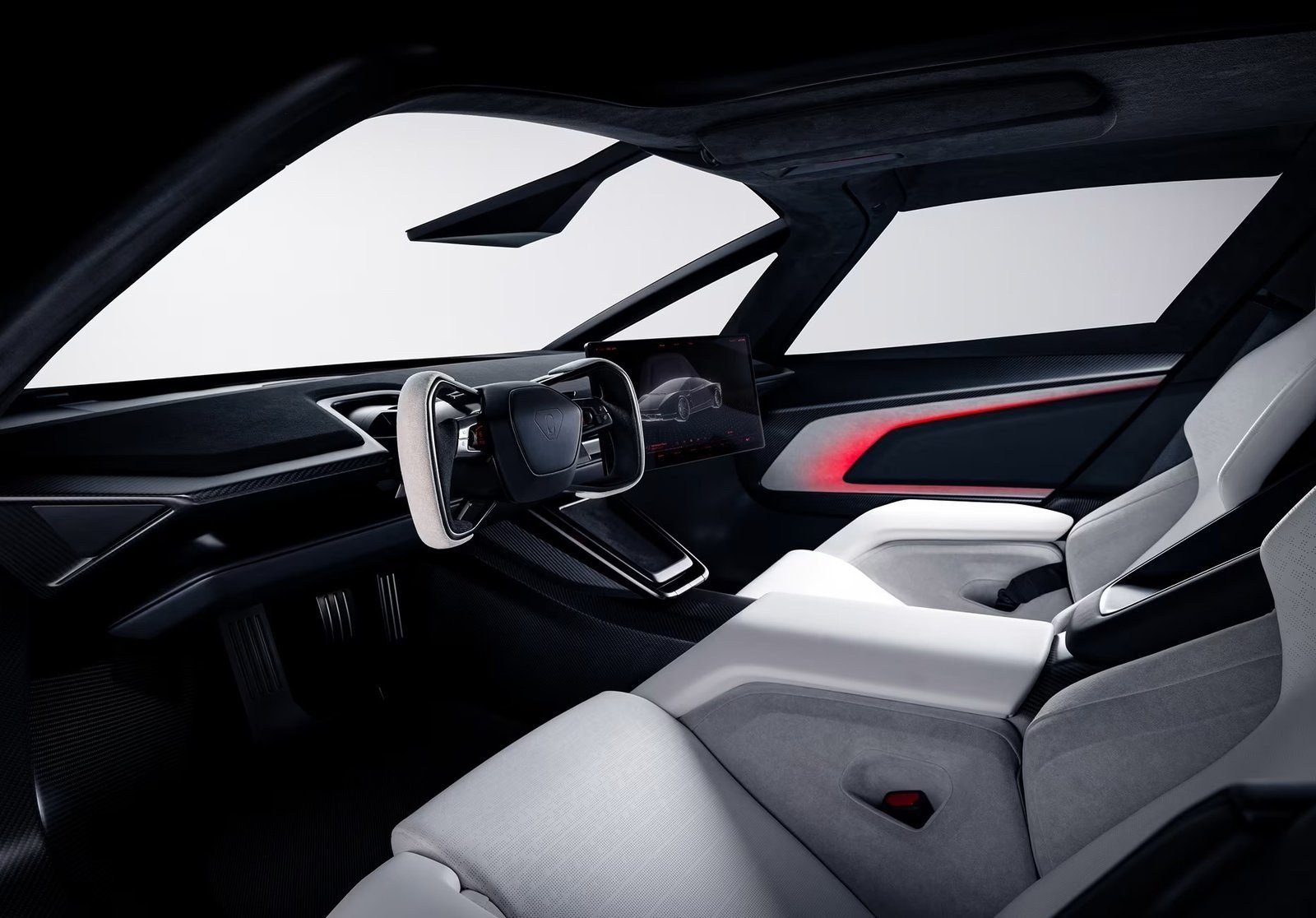 Tesla Roadster interior with yoke, screen, and two molded seats
