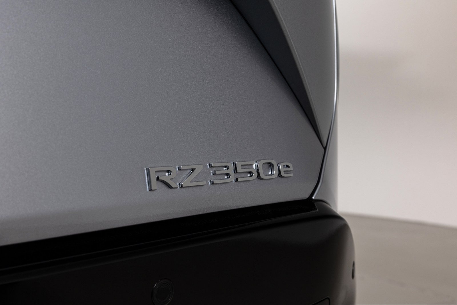 RZ 350e badge on the tailgate of a 2027 Lexus RZ