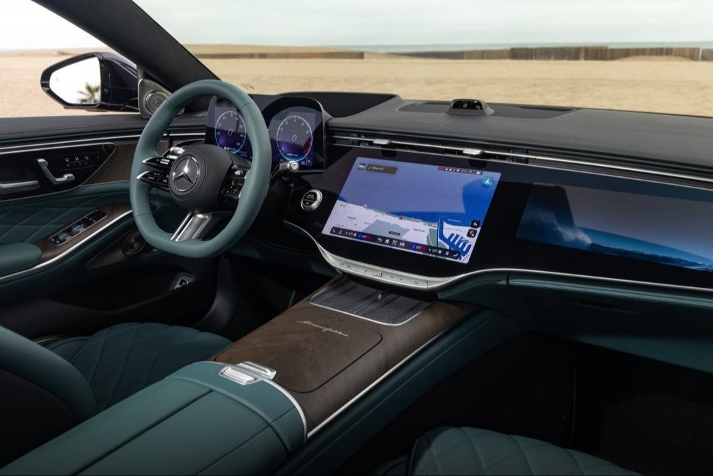 2027 Mercedes S-Class dashboard with three screens and green leather