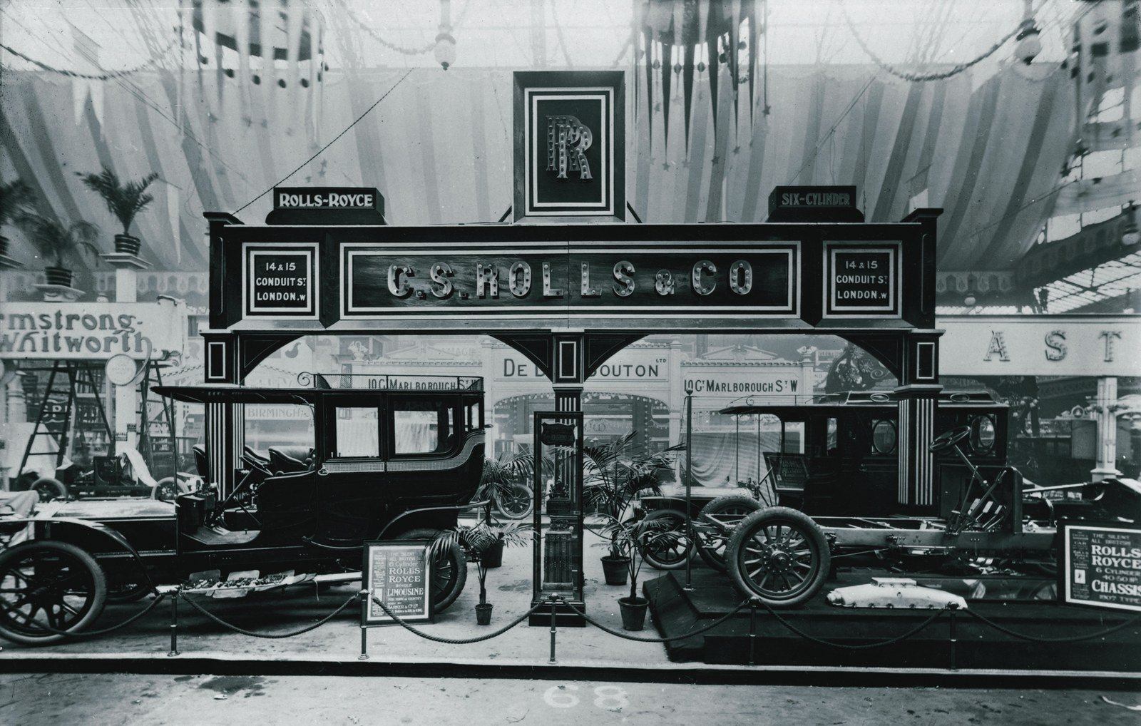 Period photo of the C.S. Rolls & Co. motor show stand