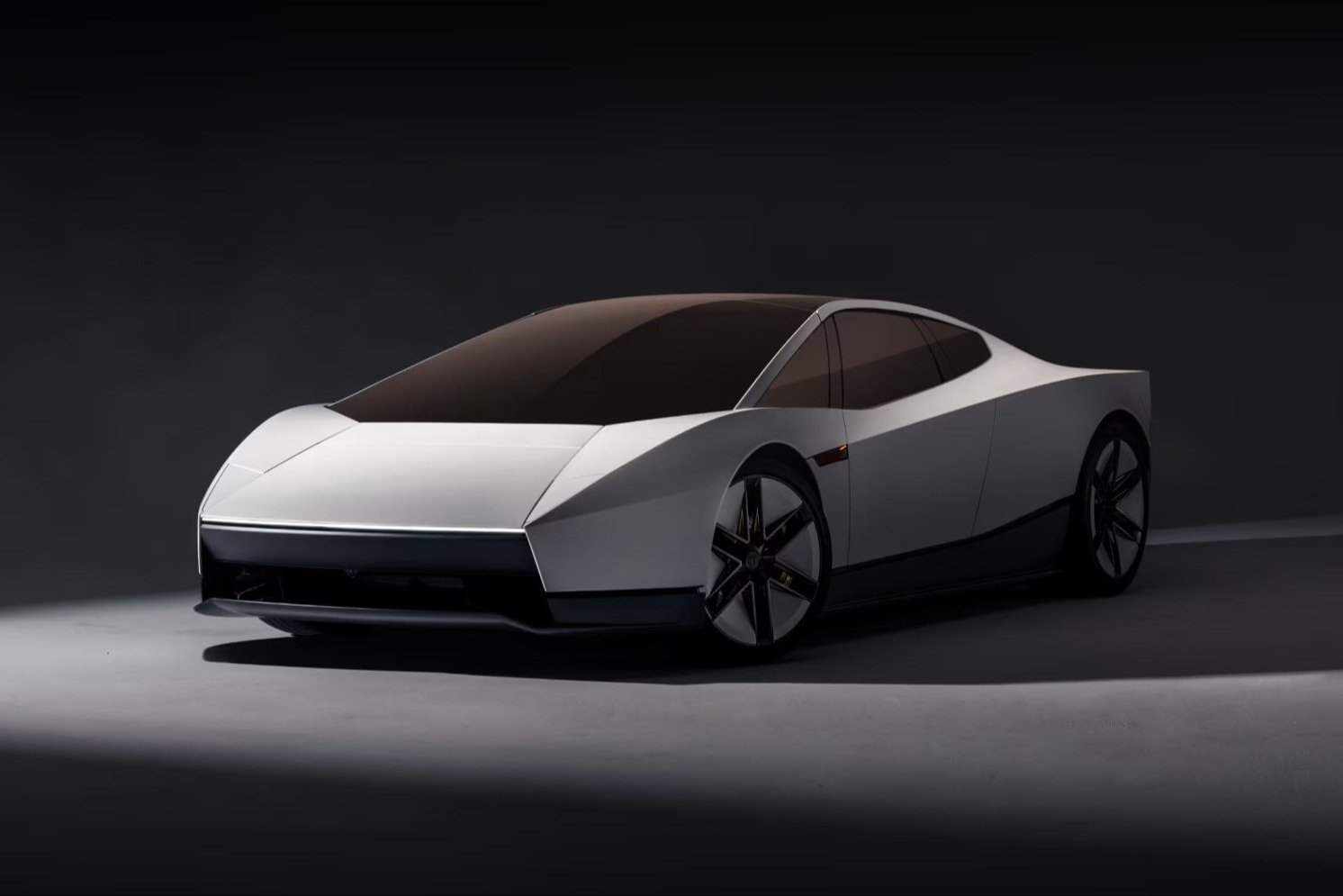Silver second-generation Tesla Roadster, front three-quarter studio view