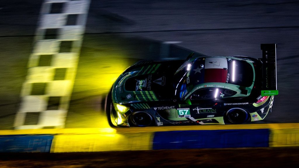 No. 57 Mercedes-AMG GT3 crosses the start-finish line at night