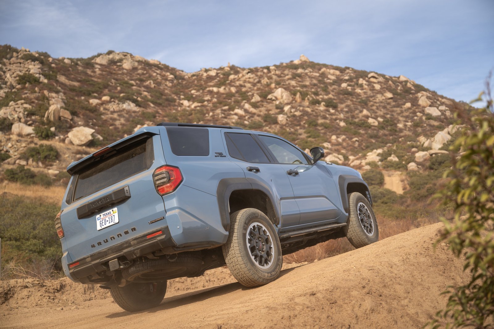 Toyota 4Runner TRD Off-Road seen from the rear on a dirt slope